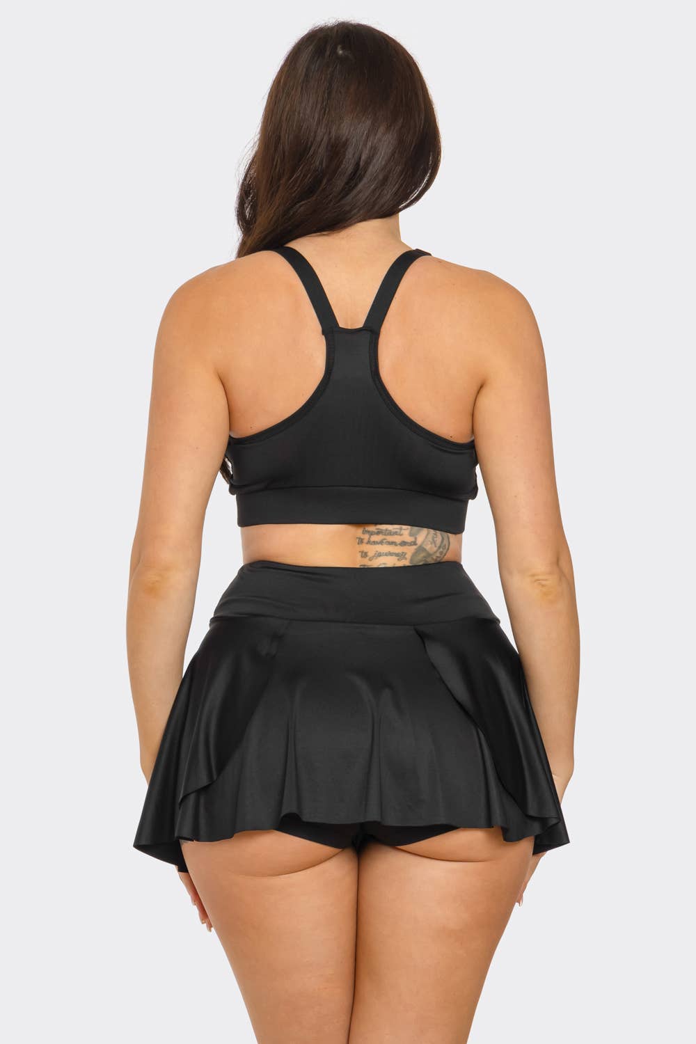 Solid Tank Top And Pleated Inside Shorts Skirt Set